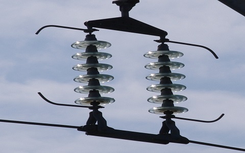 Suspension insulators provide dielectric separation between conductors