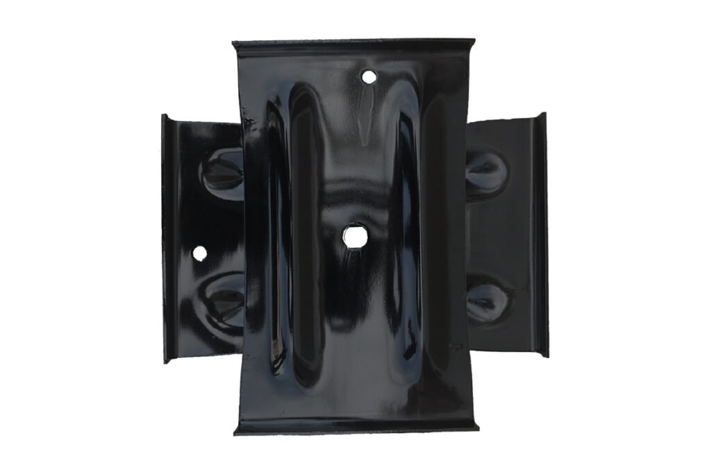 Cross plate anchors secure components along pipelines