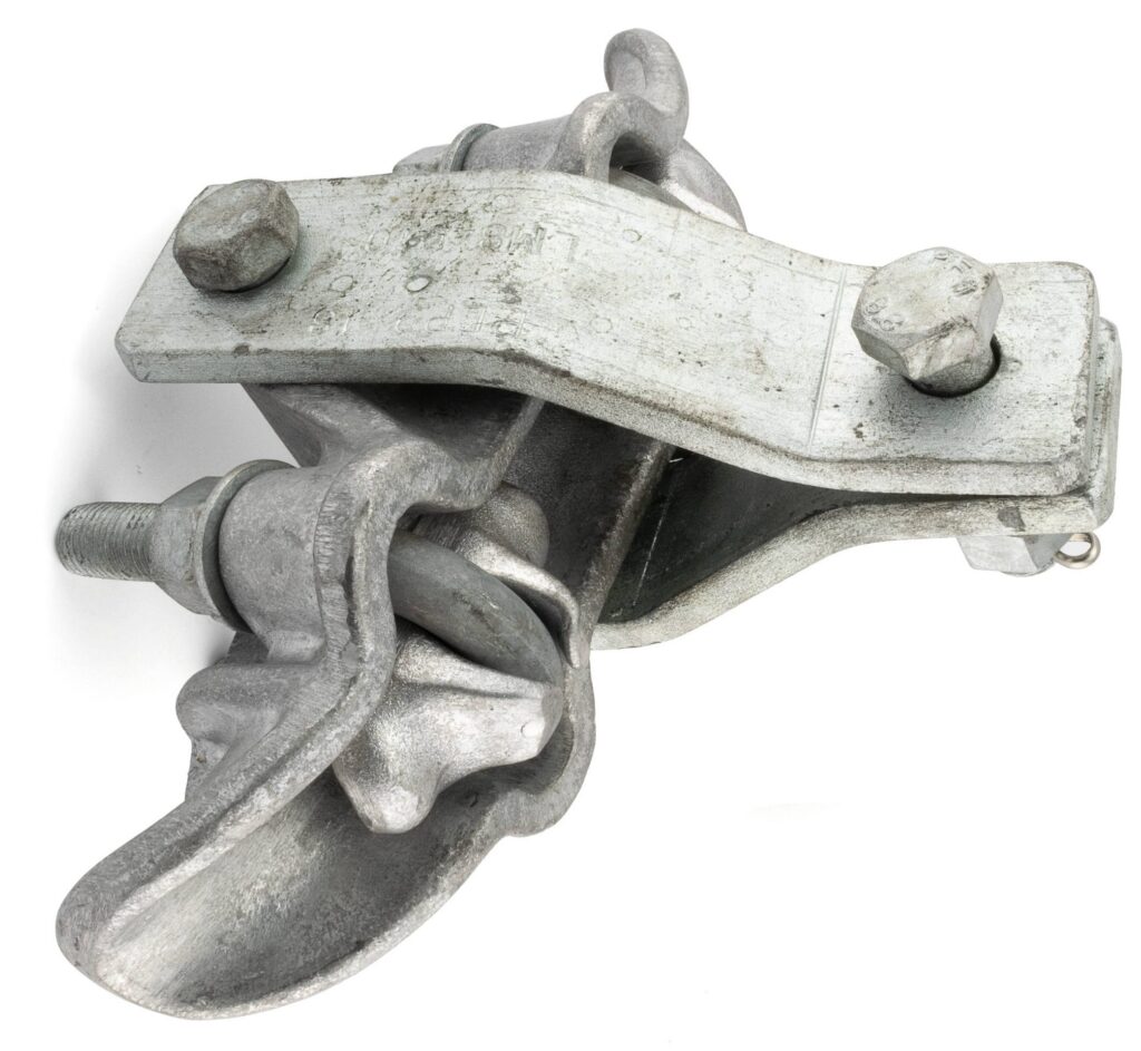 Trunnion suspension clamps support conductors on towers